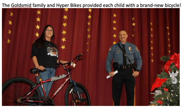 Holiday with a Hero bicycle donation