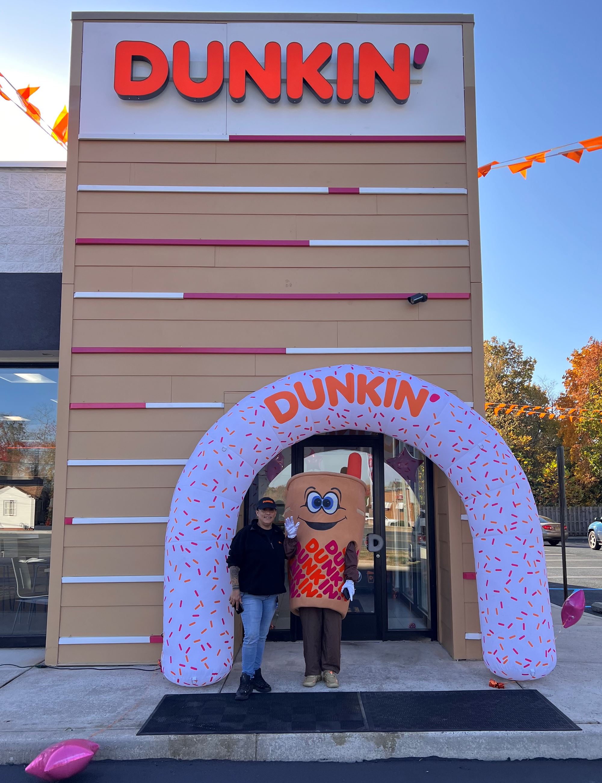 Employee and Dunkin Mascot
