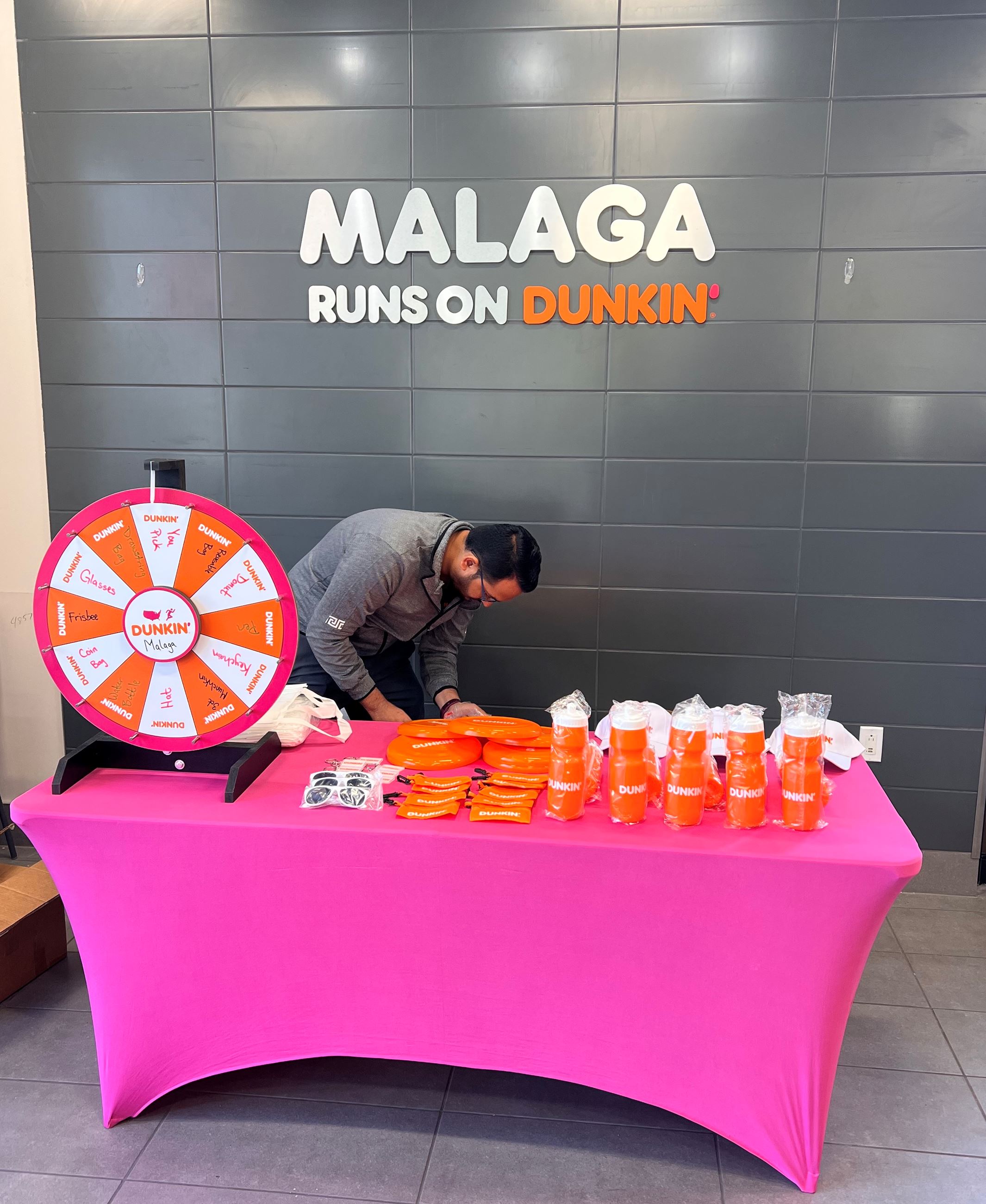 Malaga Runs on Dunkin Sign