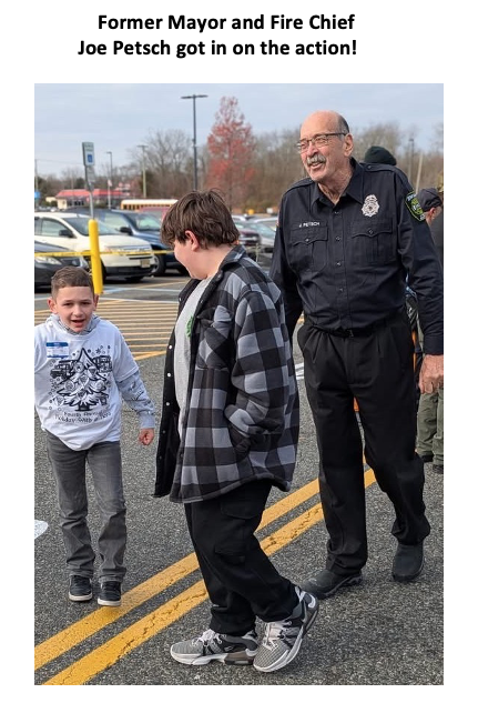 Former Mayor and Fire Chief Joe Petsch with child shoppers